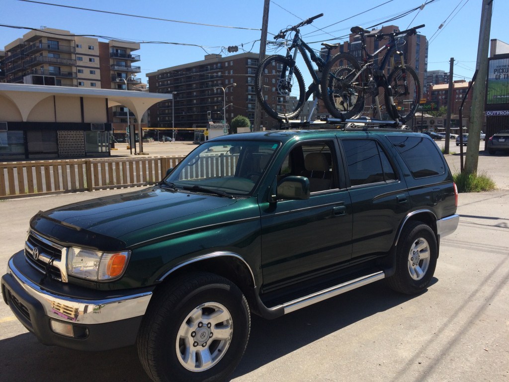 The 4Runner with a mountain bike on a hitch rack.