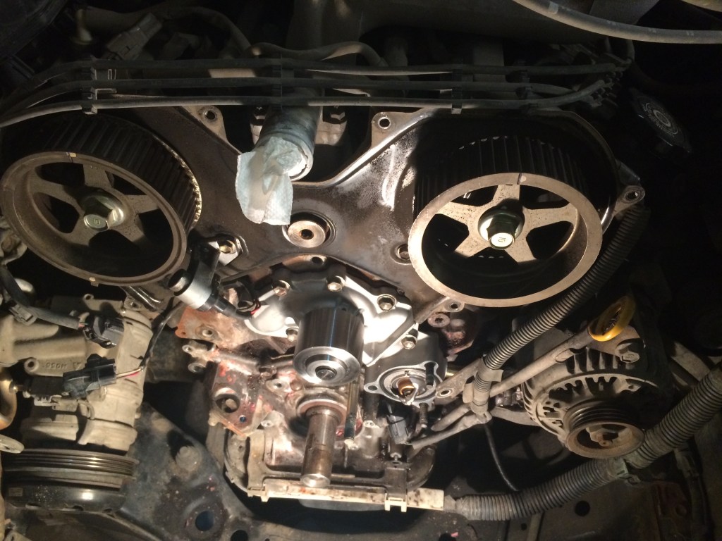 The engine bay of the 4Runner during a timing belt and water pump replacement.