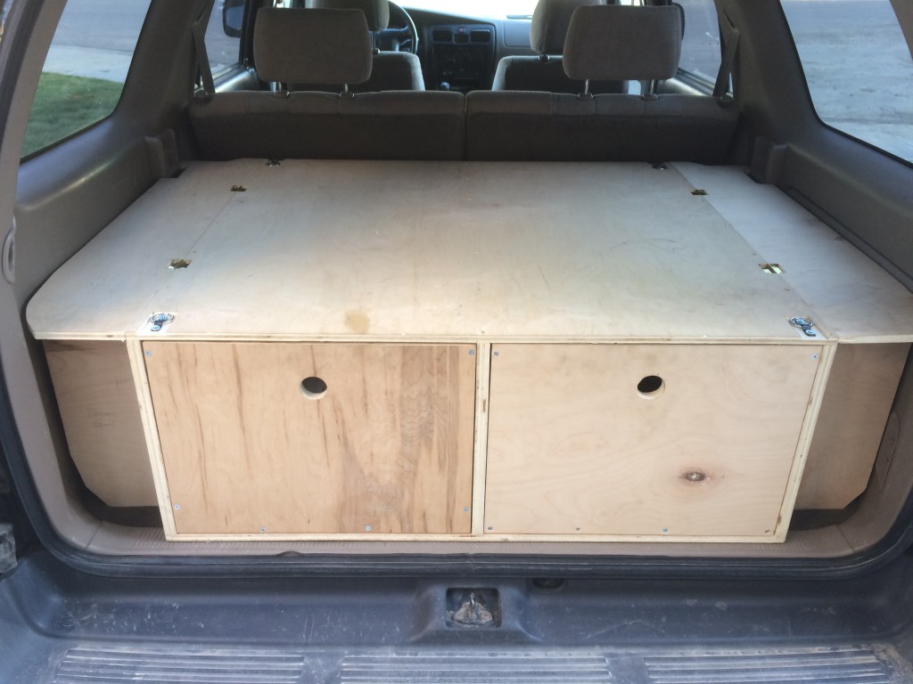 The completed and finished storage unit installed in the vehicle.